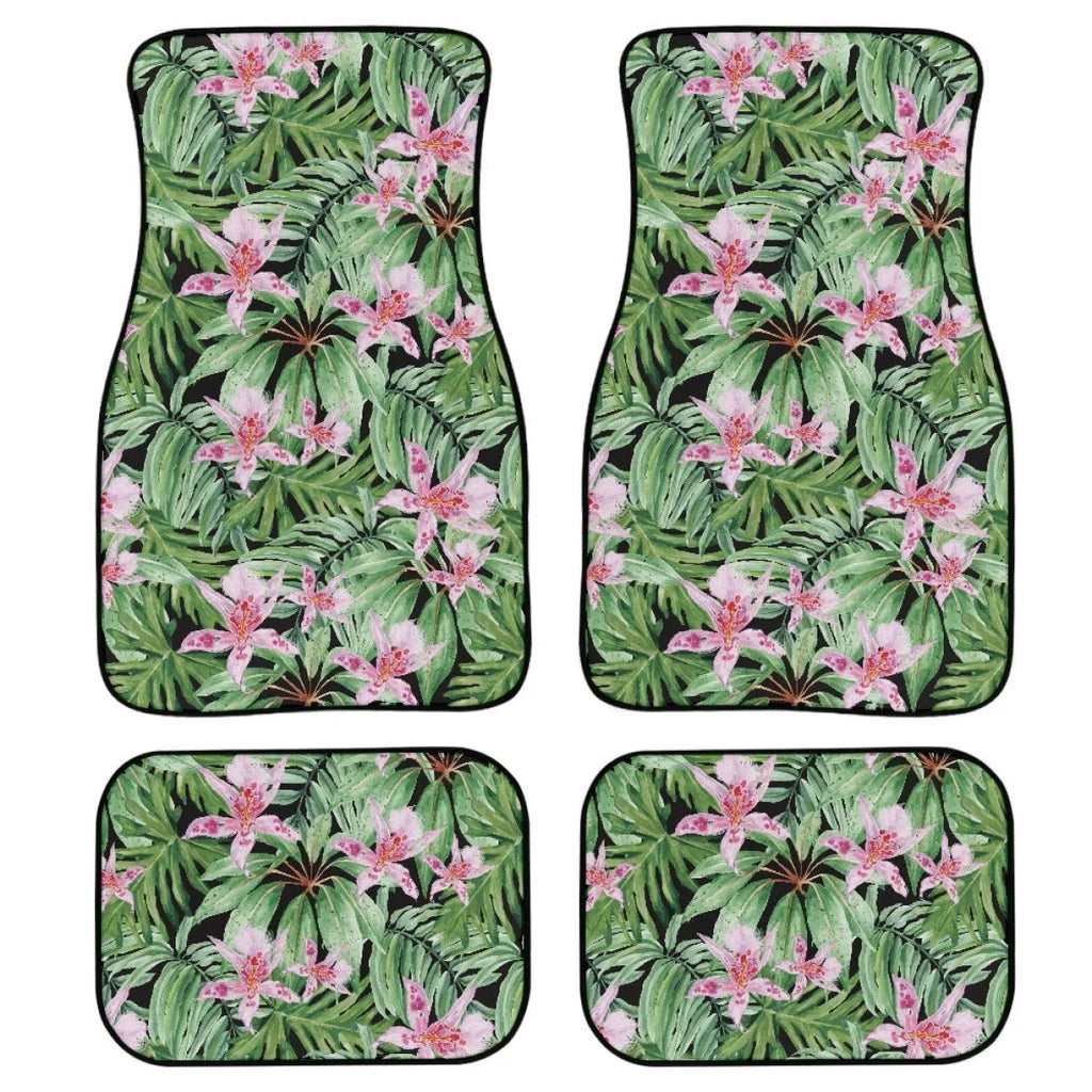 Black four-piece rubber car foot mat set with a textured surface.