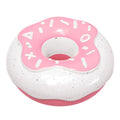 Pink donut-shaped dog toy with textured molar-cleaning surface for canine dental care