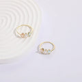 Women's Mother's Day birthstone ring with geometric triangle design and horse eye tricolor zircon stones