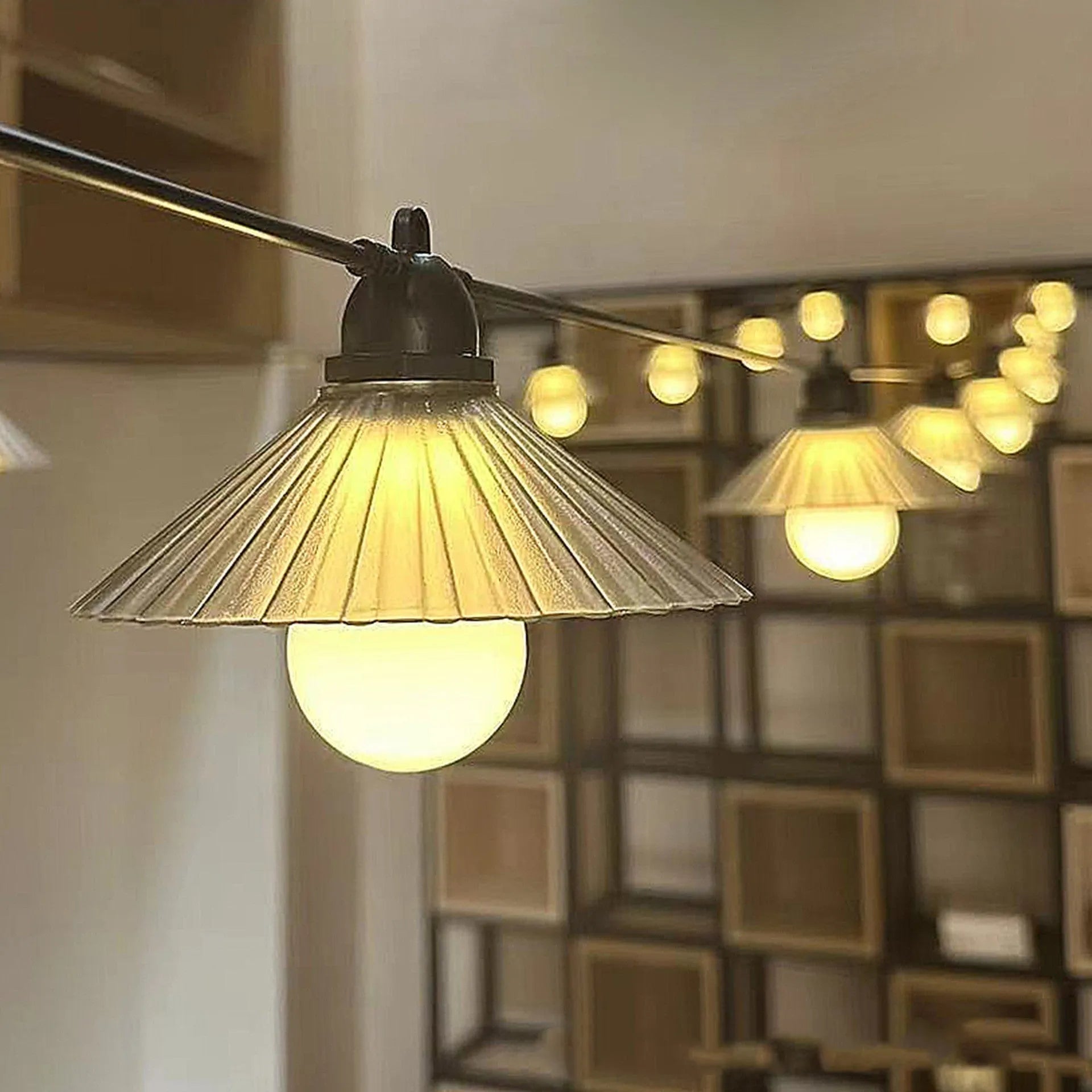 Outdoor LED string lights with flower-shaped bulbs showing IP65 waterproof rating for courtyard and camping use