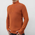 Men's grey half-turtleneck zip-front sweater made from cotton blend fabric.