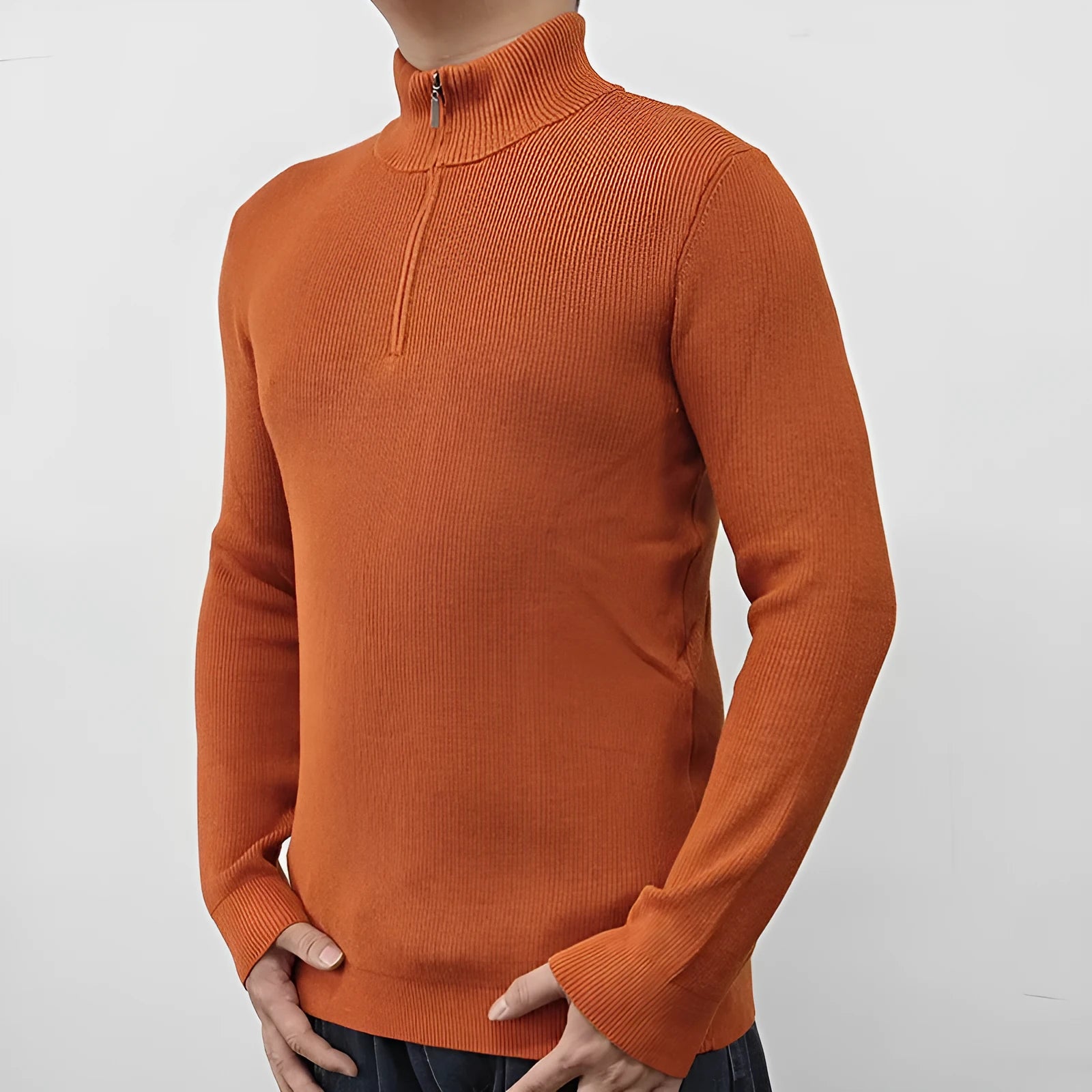 Men's grey half-turtleneck zip-front sweater made from cotton blend fabric.
