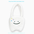 White plush shoulder tote bag with cute teeth design and zipper closure