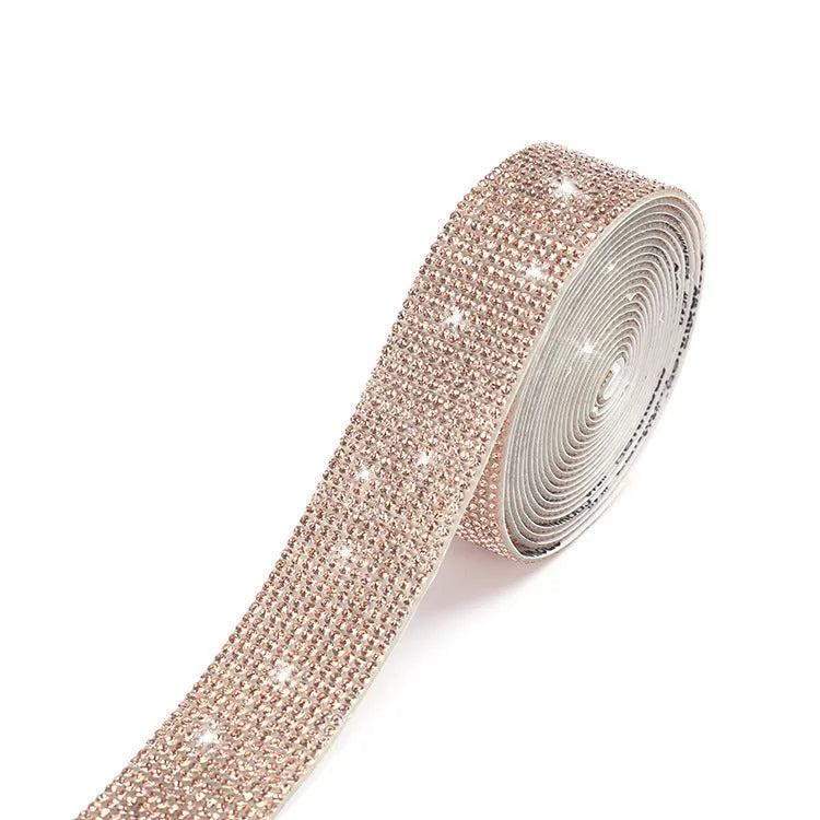 A long strip of self-adhesive, sparkly glass water drill trim on a white background, showing white and AB colour options.