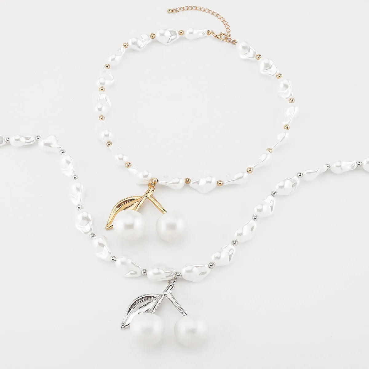 Women's irregular pearl cherry fruit necklace with gold or white K electroplated finish and adjustable 51cm-60cm length