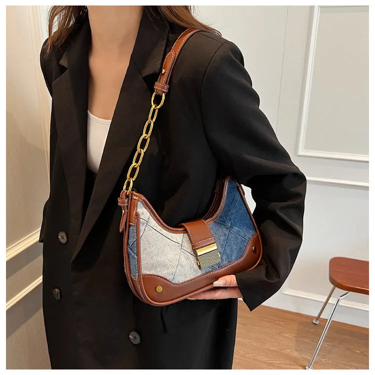 Brown denim women's bucket shoulder bag with diamond mesh chain straps and lock closure