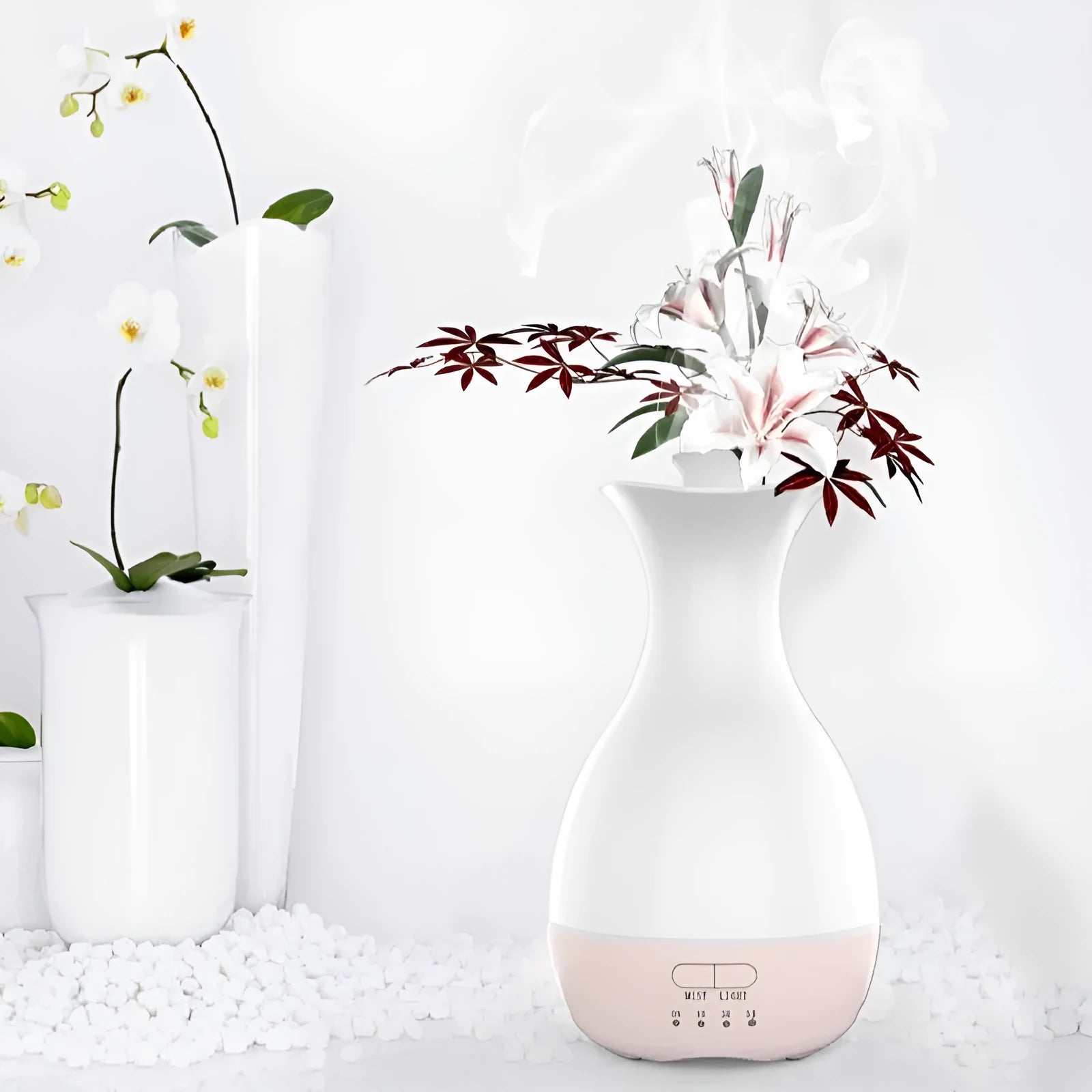 White or pink ultrasonic humidifier and essential oil diffuser vase with colourful LED night light.