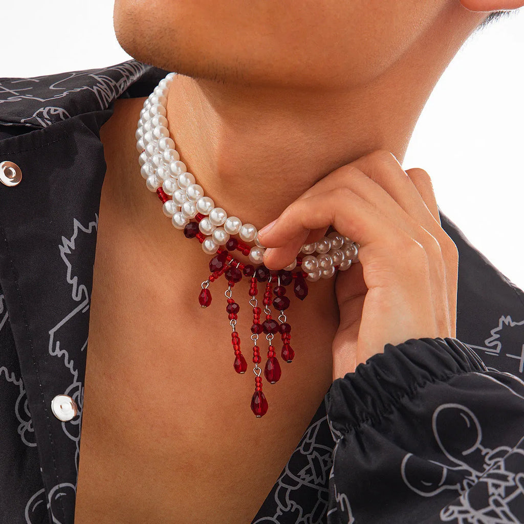 Men's Halloween necklace with geometric blood drop pendant, artificial crystal details, and imitation pearl chain.