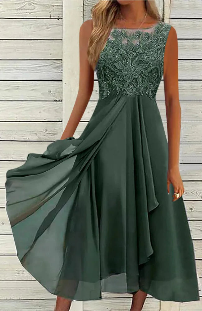 Women's sleeveless chiffon dress with hollow-out lace detail in green, shown on a hanger.
