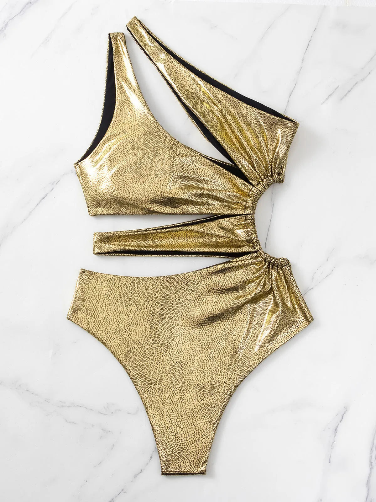 Gold backless one-piece women's swimsuit on hanger showing solid colour and sleeveless design