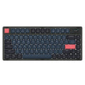 Ajazz AK832PRO green and tea coloured three-mode mechanical keyboard with RGB lighting on a desk.