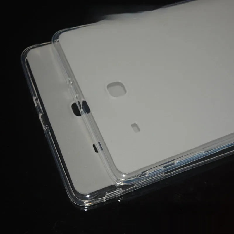 Clear transparent white ultra-thin silicone protective case for a tablet on a flat surface.