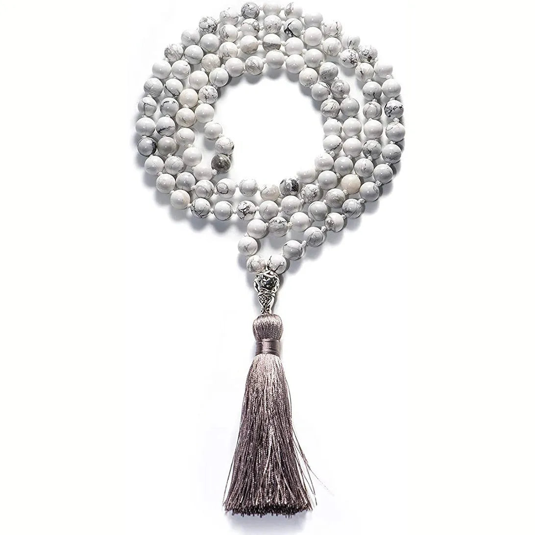 Long multi-stone agate and amethyst tassel necklace with blue pattern, geometric beads.