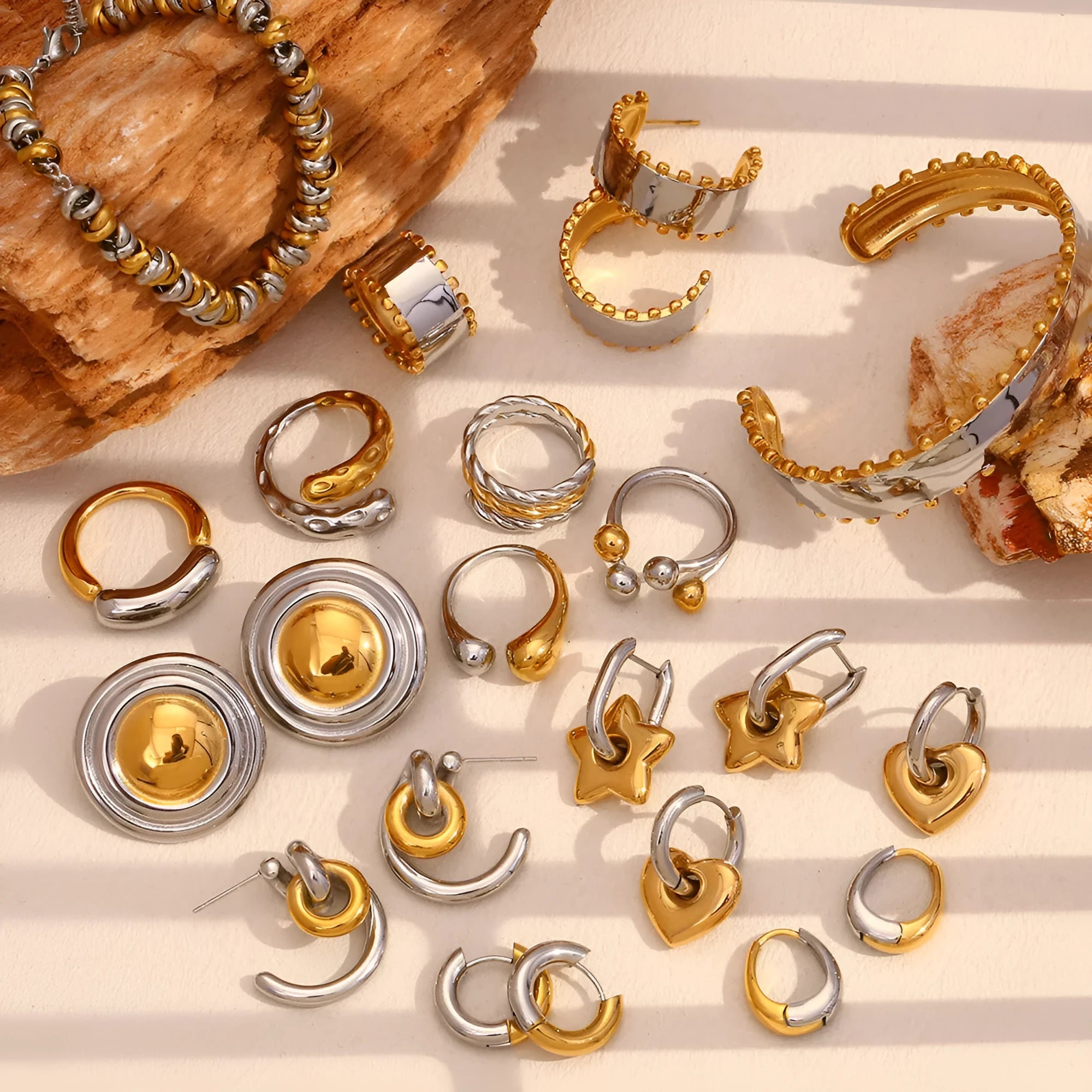 Gold electroplated geometric jewellery set with earrings, necklace, and bracelet