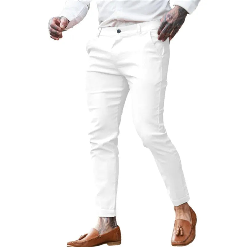 Men's slim-fit pencil trousers in stretch cotton twill fabric, shown in a dark blue colour.