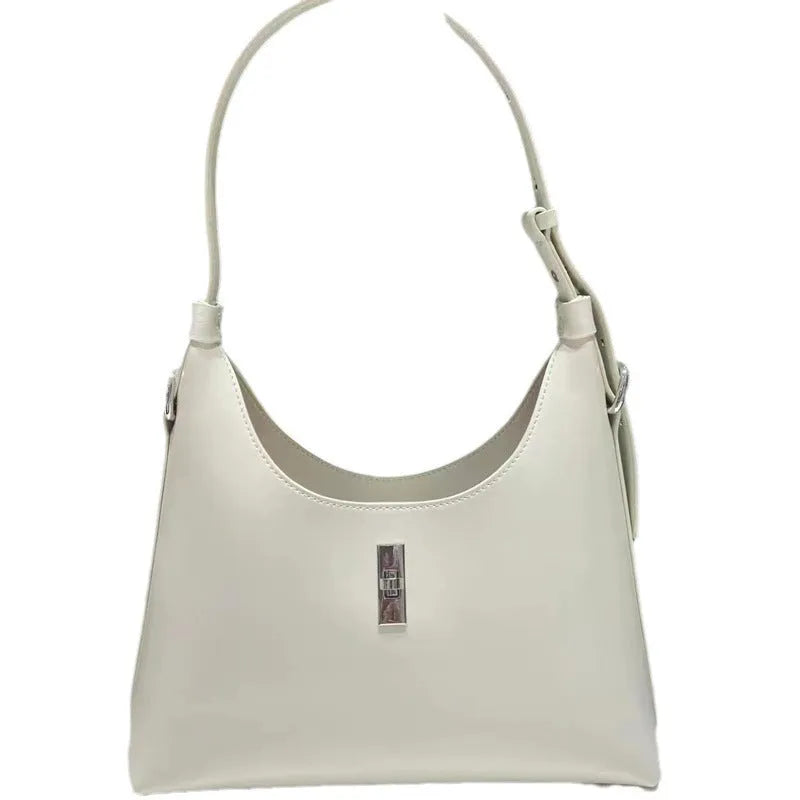 Genuine leather dumpling-shaped crossbody bag with shoulder strap and multiple pockets