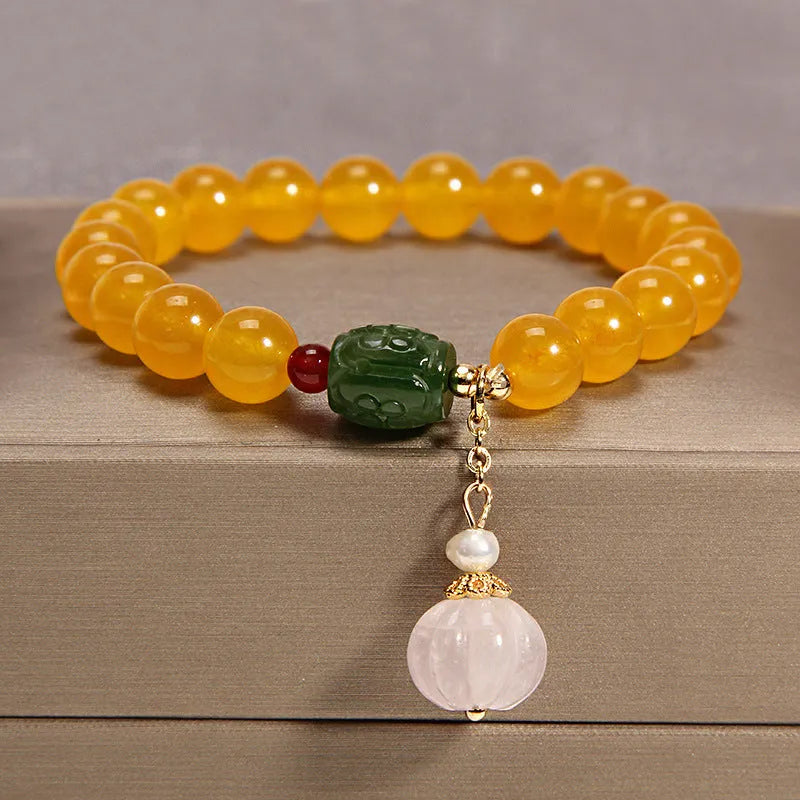 Yellow agate crystal and gold silk women's bracelet in khaki colour.