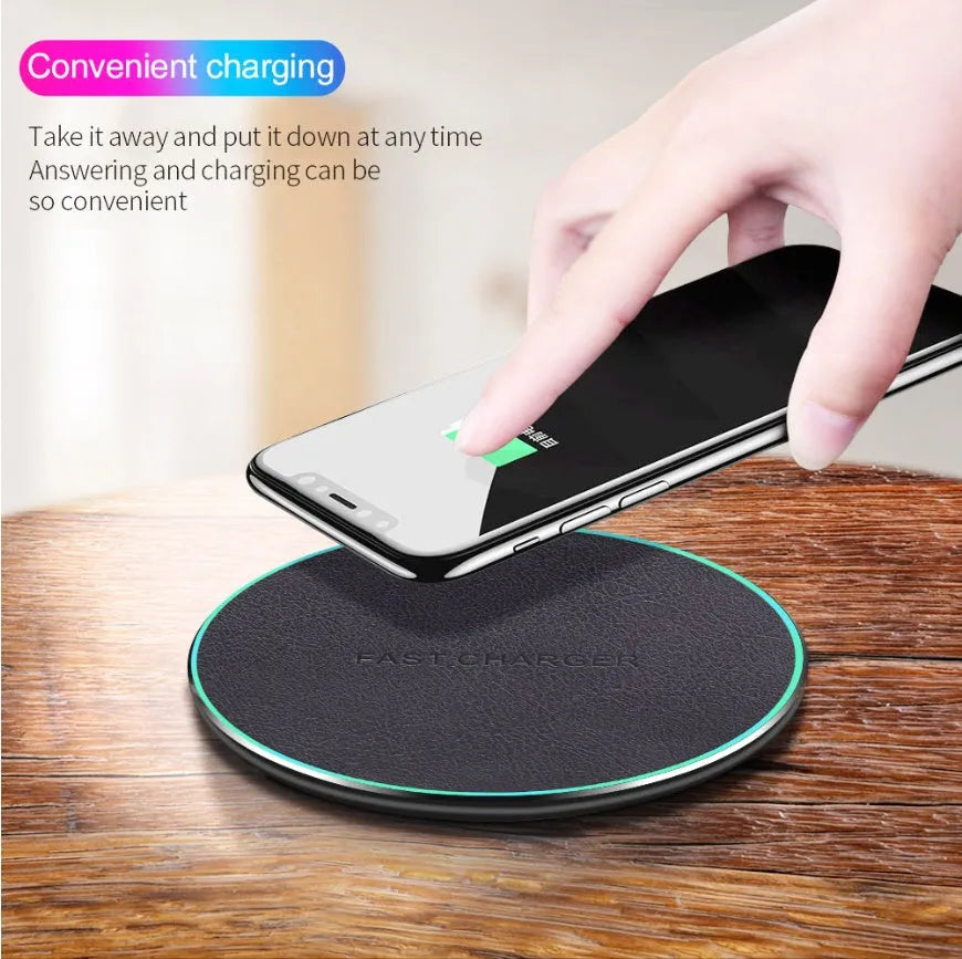 Black Qi wireless charging pad for iPhone 11 with integrated USB cable