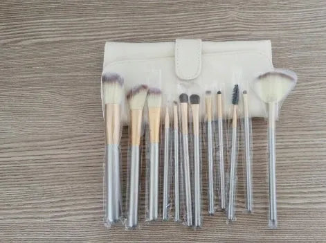 Persian makeup brush set with white bristles and champagne handles in 12, 18, or 24 piece options