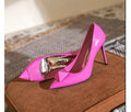 Women's pink patent leather pointed toe stiletto heels with rivet buckle decoration
