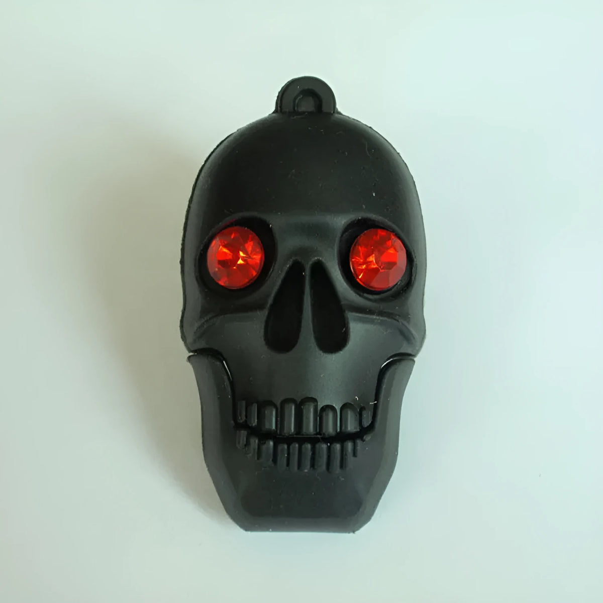 Halloween-themed skeleton skull USB flash drive with chain, showing detailed PVC cartoon design.