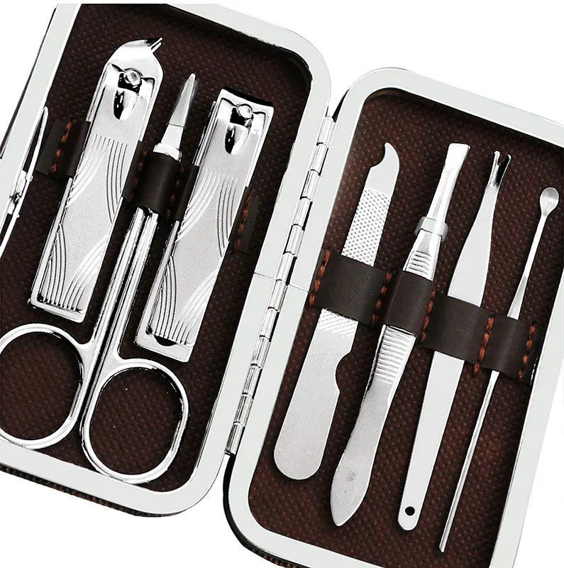 7-piece checked pattern manicure set with stainless steel nail clippers, eyebrow scissors, file, cuticle fork and ear pick, 110x60x20mm