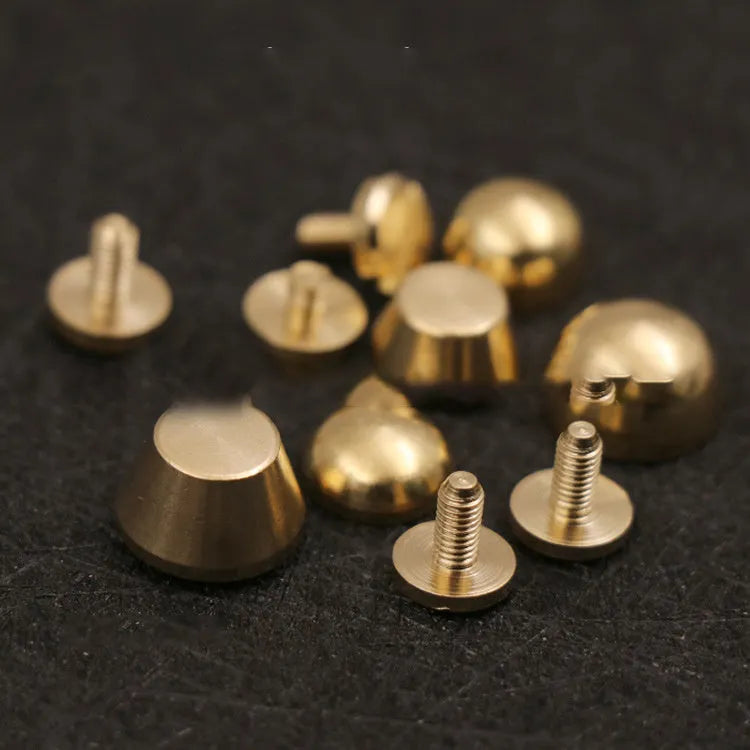 Brass decorative buckle foot nails in round and geometry bucket designs, sizes 10x6mm and 12x7mm.