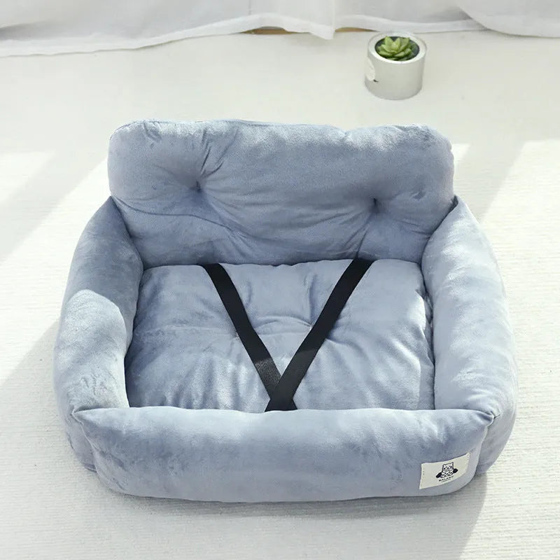 Grey and blue plaid car-mounted stain-resistant dog travel nest in two sizes.
