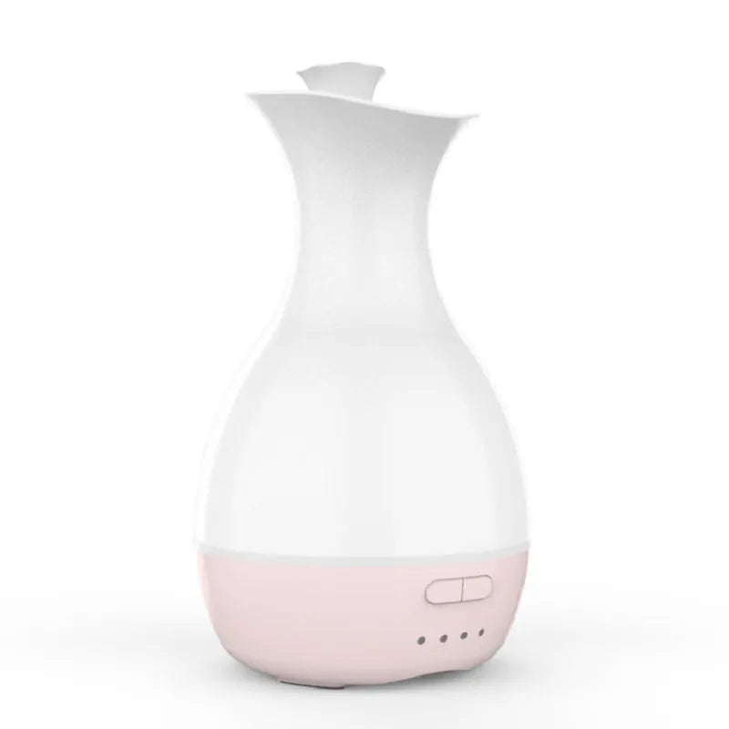 White or pink ultrasonic humidifier and essential oil diffuser vase with colourful LED night light.