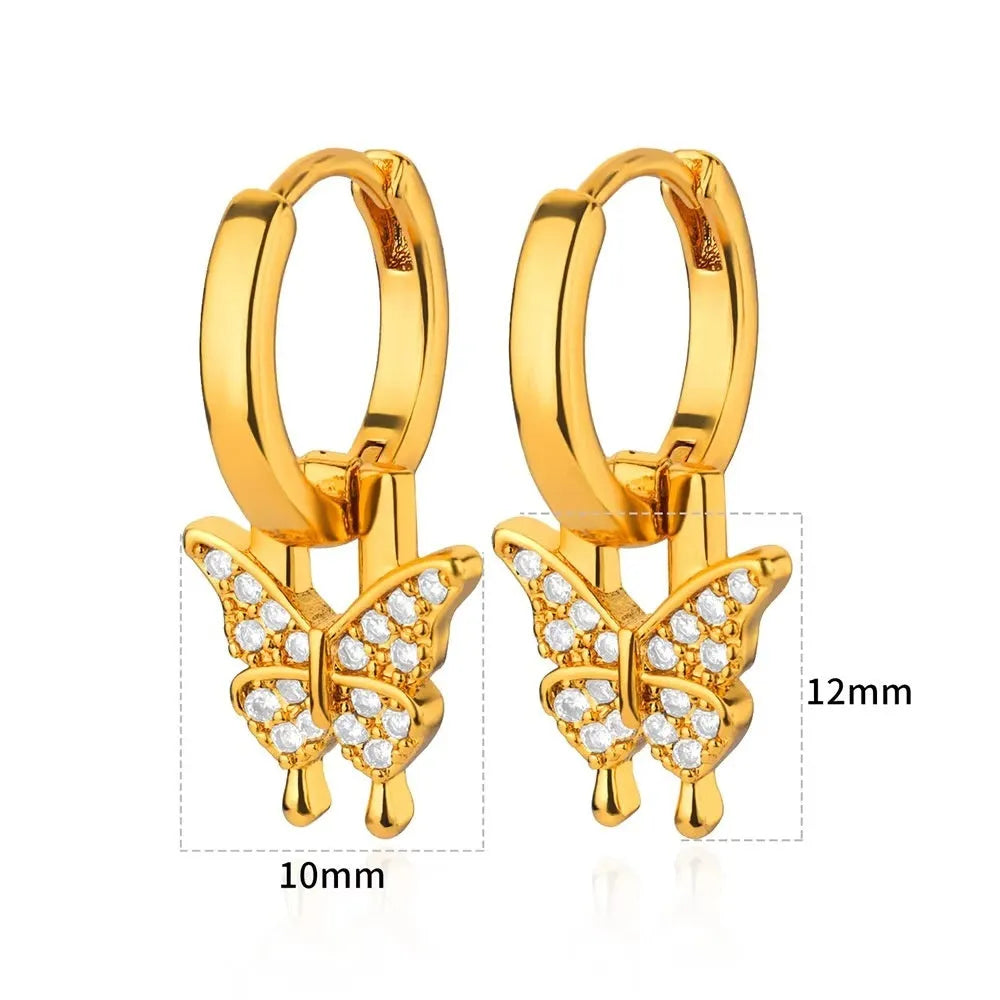 Geometric butterfly earrings with heart and star shapes in copper