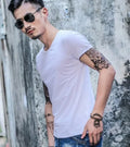 Men's bamboo fibre summer T-shirt in assorted colours on a hanger.
