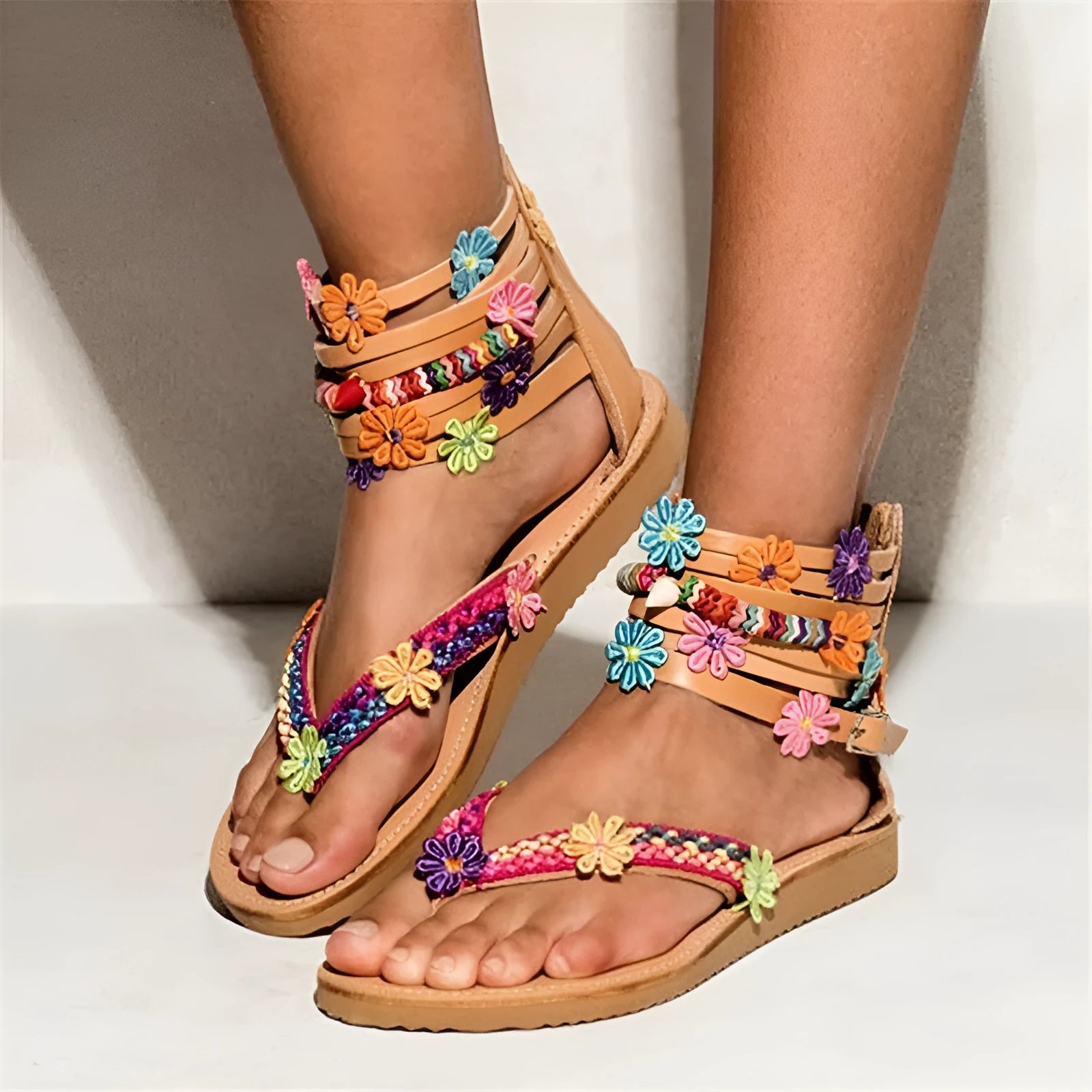 Ethnic style beaded petal floral sandals with artificial PU upper and round toe.