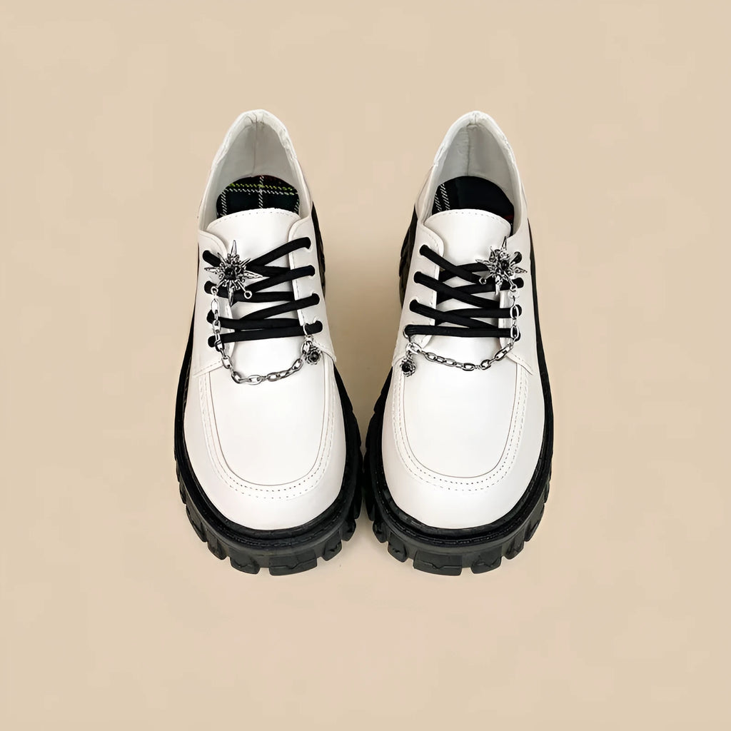 Women's preppy jk style loafers in Duke Asterism colour with metal cross shoulder straps and round toe