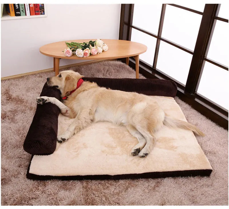 Corduroy pet dog bed with bolster sides on a non-slip base, shown in grey colour.