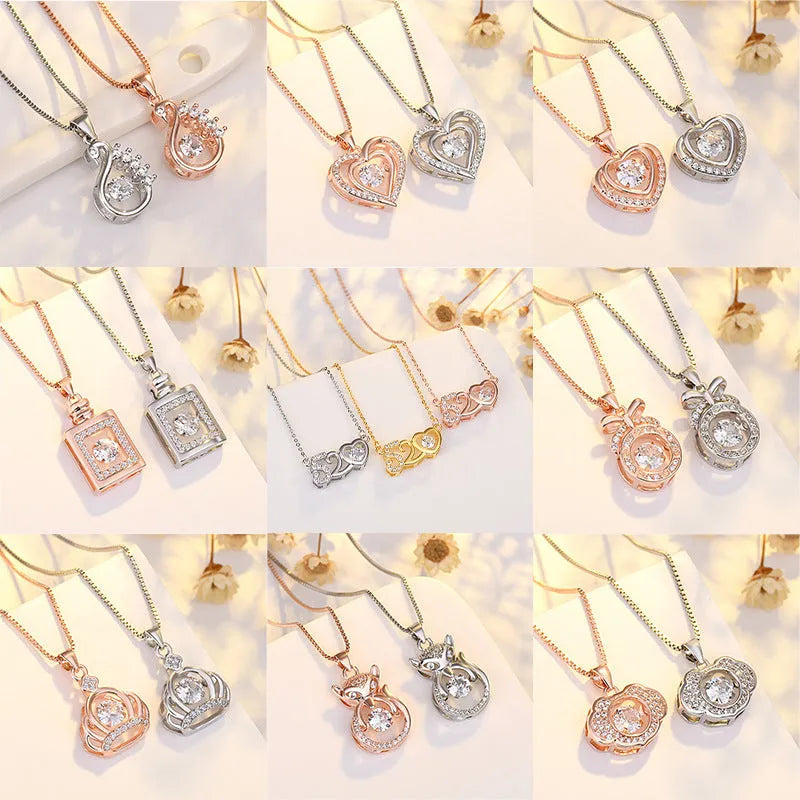 Sterling silver heart pendant necklace with crown and bow detail in rose gold or silver finish