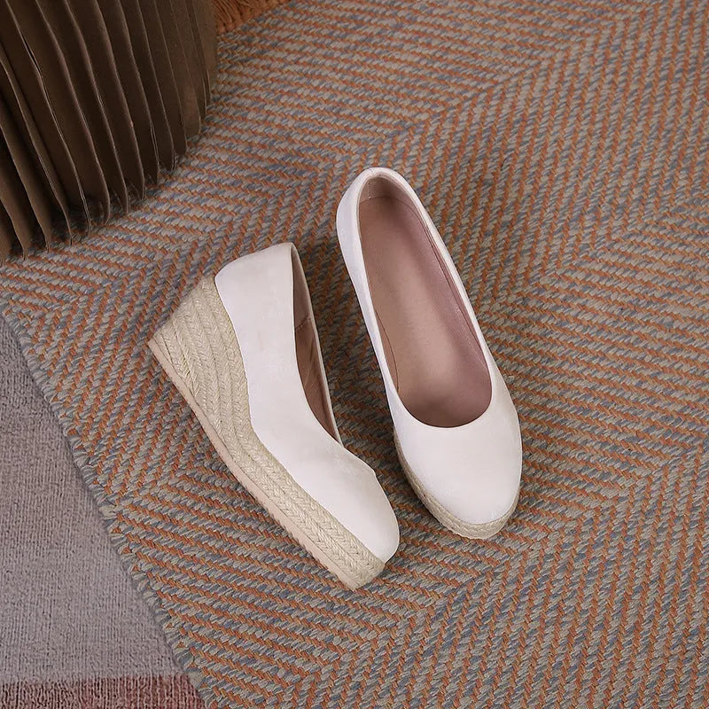 Women's wedge heel pumps with rope-wrapped wedge and shallow front opening
