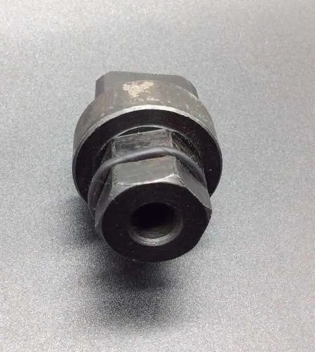 Aodi T40058 special service tool, a crankshaft rotating sleeve for engine timing with directional arrows.