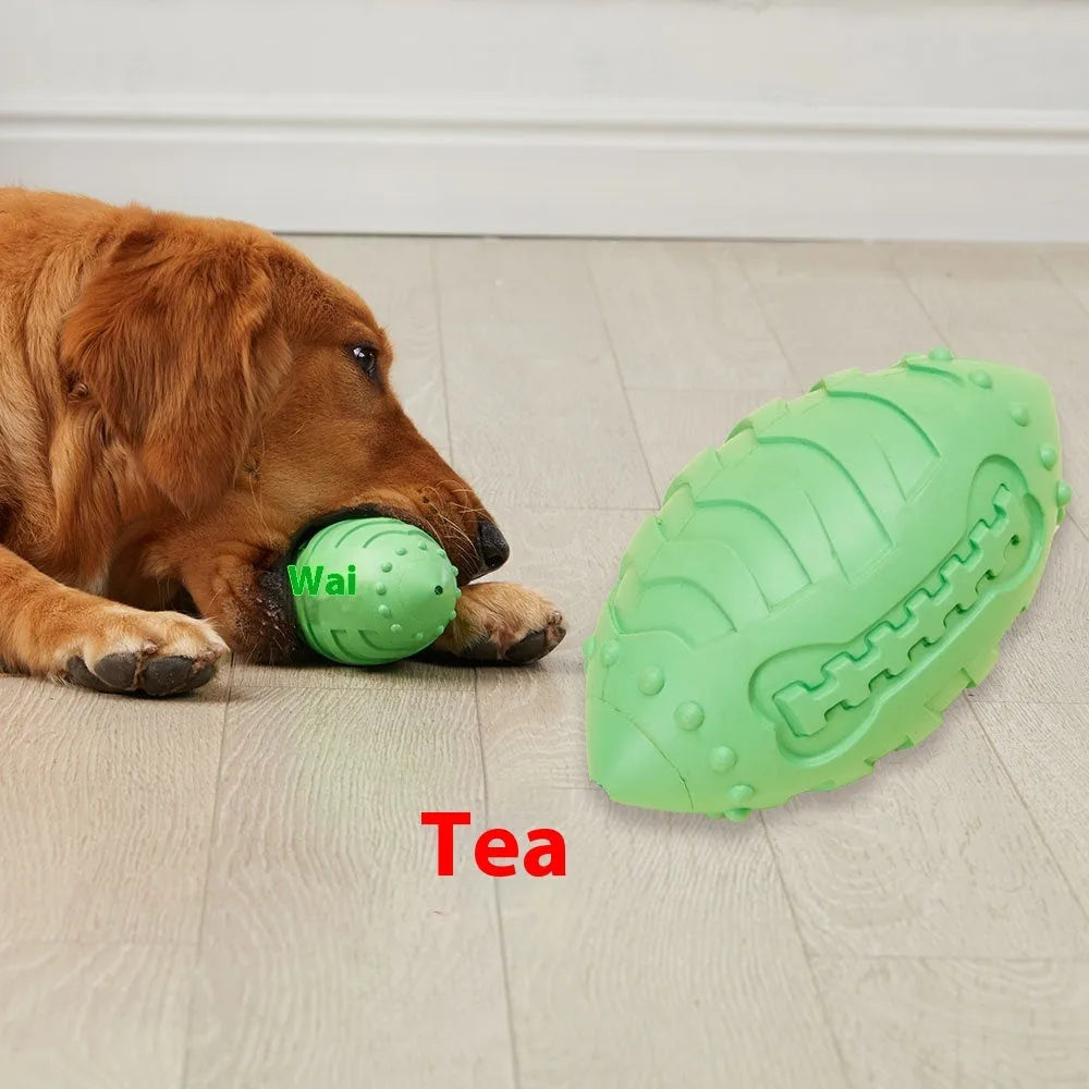 Sapphire blue rubber rugby ball dog toy with bite-resistant thickened construction.