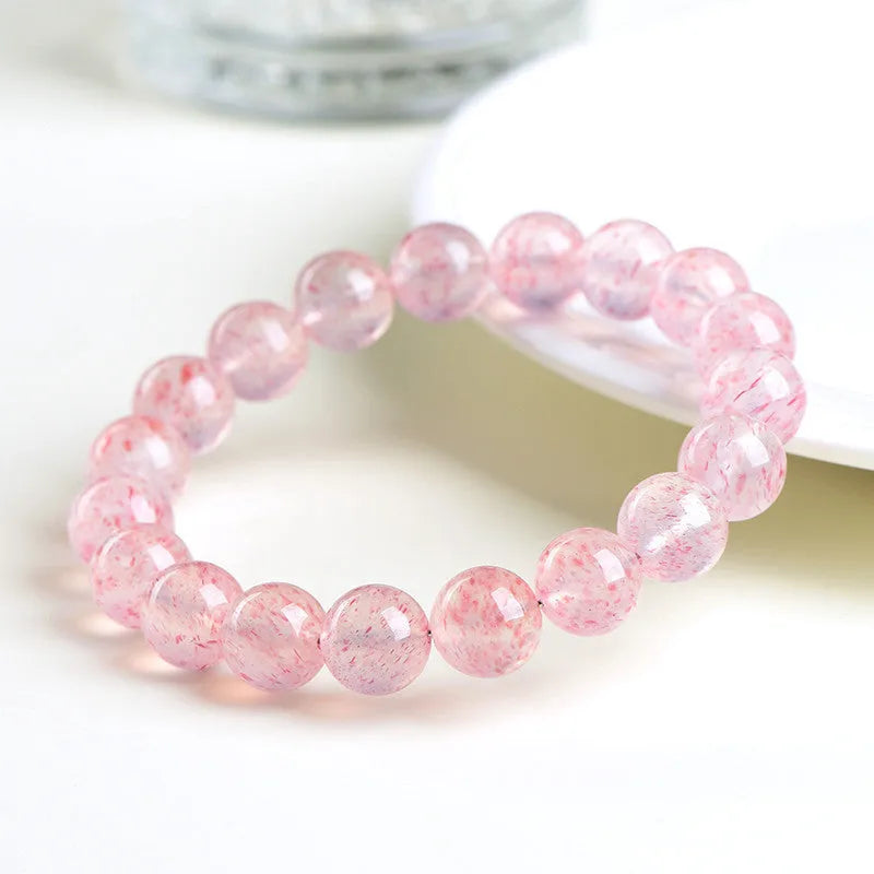 Strawberry quartz crystal ball bracelet with natural white water body colour and geometry beads