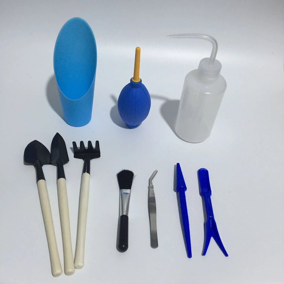 14-piece succulent gardening tool set with watering can mini shovel rake and tweezers on white background