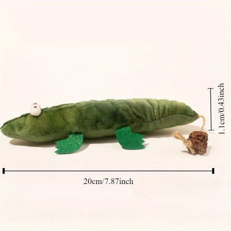 Green plush alligator cat toy measuring 28cm long with textured surface for feline play