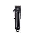 Professional black rechargeable hair clipper with four plastic limiting combs and accessories on a white background.