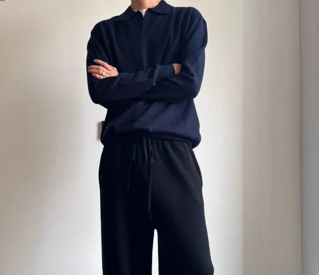 Man wearing a milky white pure wool lapel collar polo sweater with loose fit