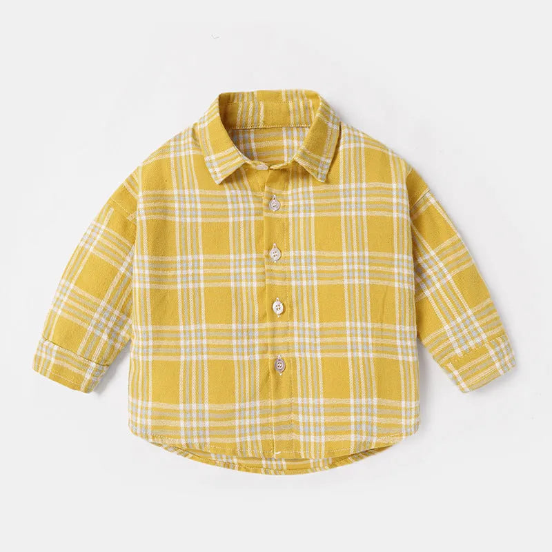 Boy wearing a long sleeve cotton casual shirt with a lattice animal print in light blue.