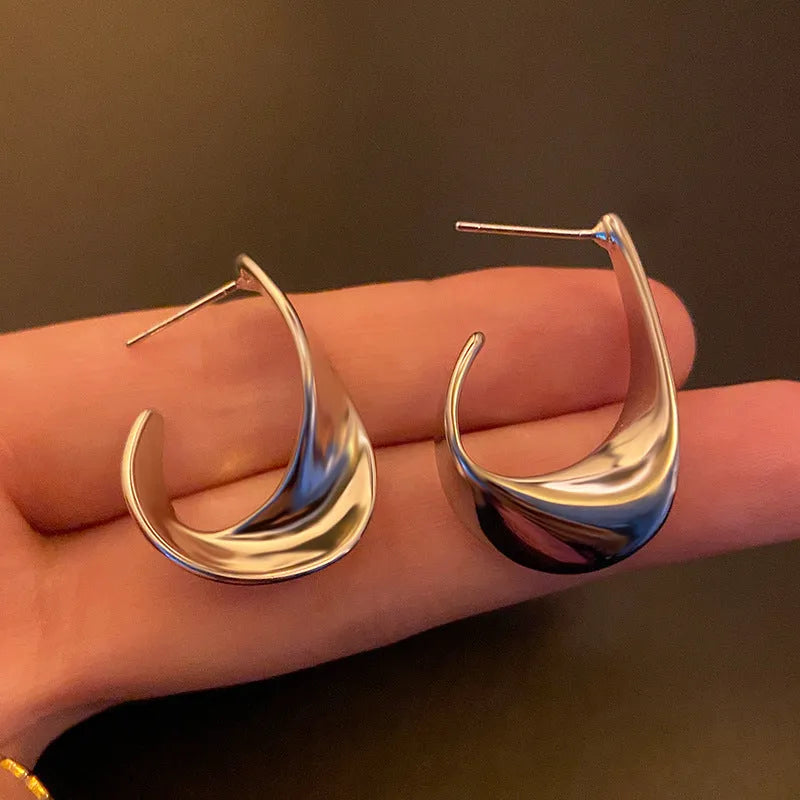 Twisted geometric metal earrings with gold or silver electroplated finish