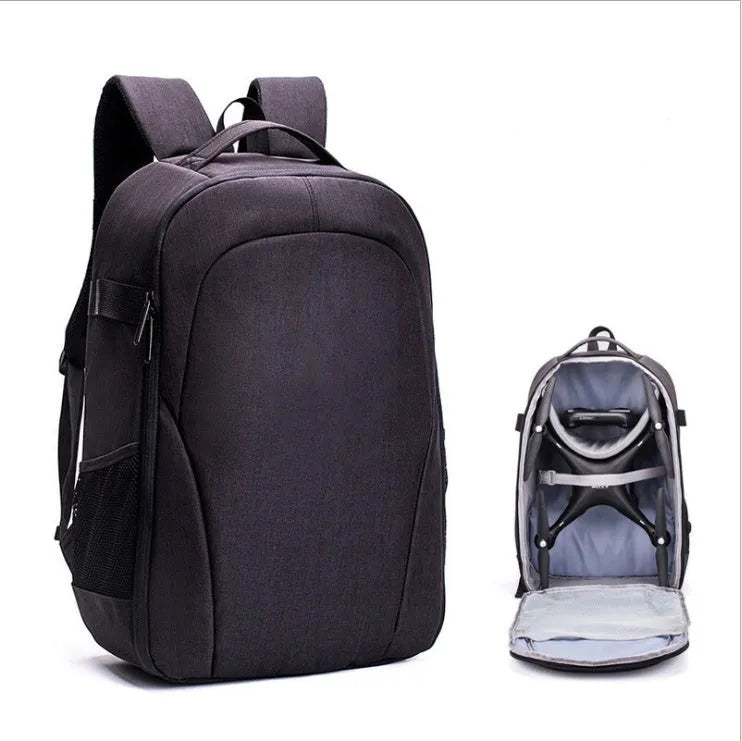 Black Oxford cloth drone backpack showing internal camera and laptop compartments.