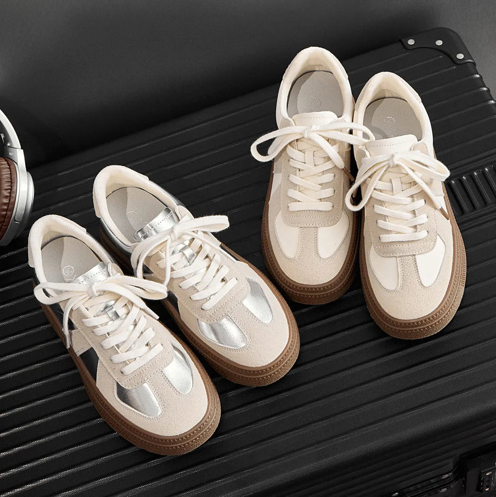 Milky white round toe board shoes with cross shoulder straps and front lace-up fastening