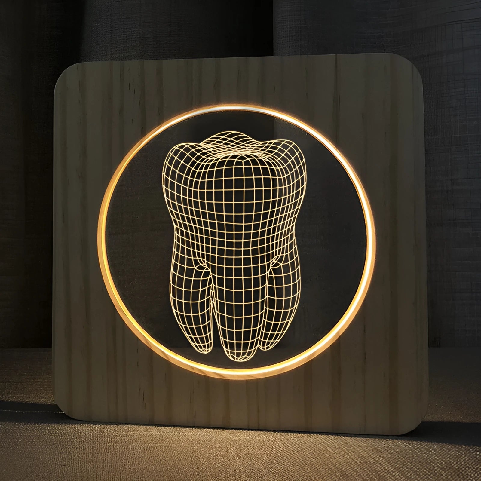 Tooth-shaped wooden colour acrylic USB night lamp on a table