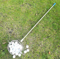 A metallic coloured 304 stainless steel golf ball picker on a green background.