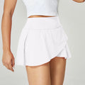 Women's solid colour quick-dry nylon sports shorts for running and fitness.